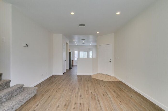 Building Photo - Bright & Airy 3-Bedroom Home with Private Balcony & Open Flow Living * COMING SOON *