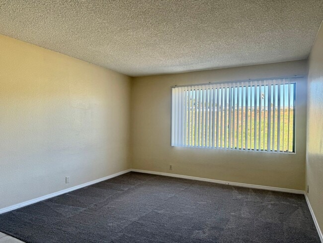 Building Photo - 2BD/2BTH with Private Patio, Walk-In Closet, Onsite Laundry, and Parking!