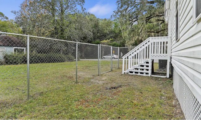 partial fenced in side yard - 113 Moore St