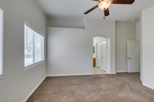 Building Photo - Great townhome in Henderson Gated Community with a 2 car attached garage and backyard