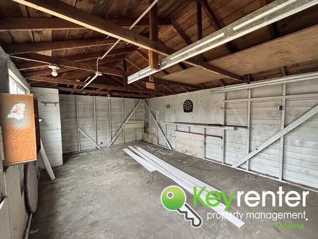 Building Photo - 4 Bedroom 2 Bathroom Tacoma Rental with Ga...