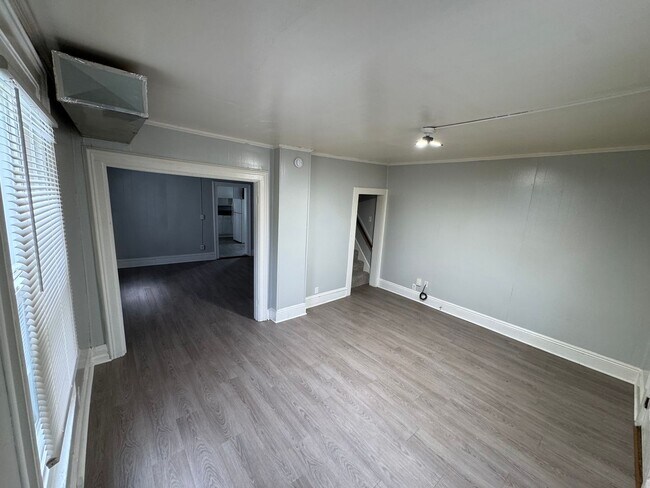 Building Photo - Interested in a two-bedroom house that includes a large garage. Please let us know