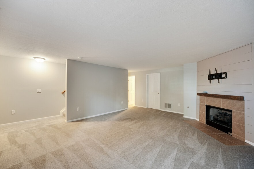 Lower Level Family Room - 5757 High Rock Dr