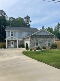 Building Photo - Beautifully Furnished 4-Bedroom Home with ...