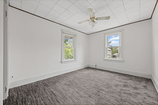 Building Photo - Bright living ? cozy dining flow for everyday comfort and easy entertaining.