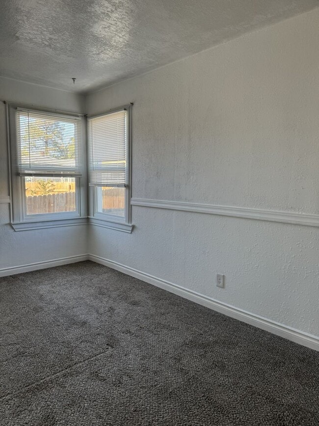 Building Photo - See the potential in this charming rental