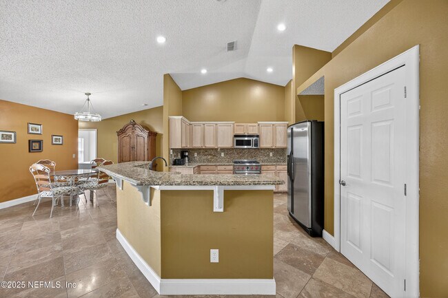 Building Photo - 10375 Woodley Creek Blvd