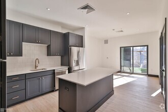 Building Photo - Two-bedroom apartments coming available at...