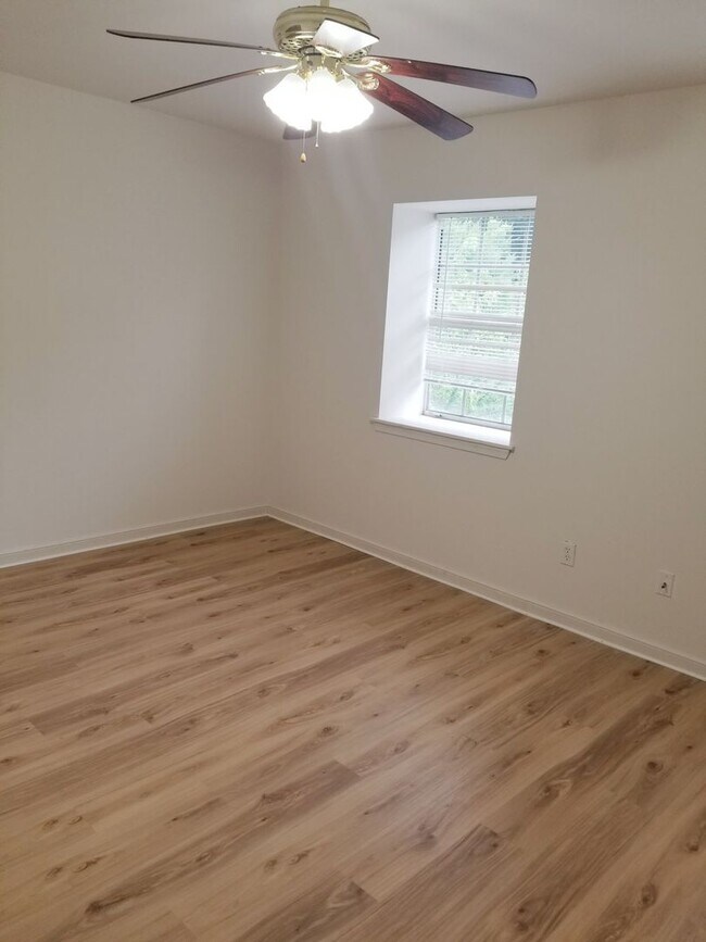 Building Photo - A spacious 3-Bedroom 1.5-Bathroom 3 Story Townhouse off of Old Forest Road With a Pool