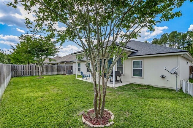 Building Photo - Charming 3-Bedroom Home in The Hideaway – ...