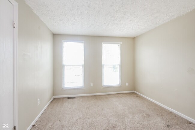 Building Photo - 5678 Colonist Cir