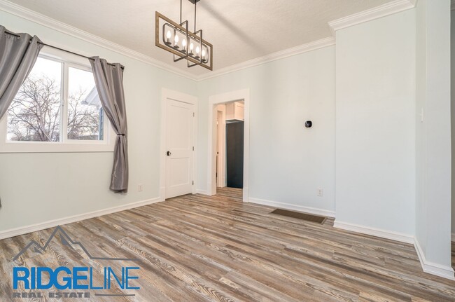 Building Photo - Remodeled home with large dining and livin...