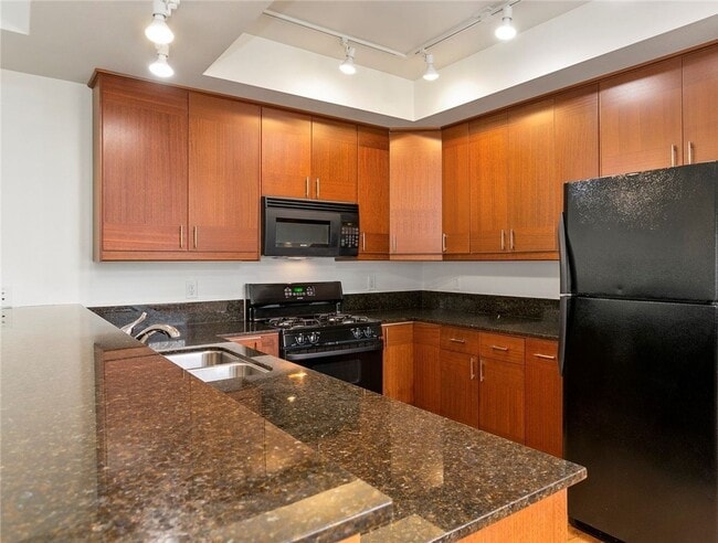 Building Photo - Spacious 3-Bedroom Condo/Townhome in Peaceful Cordata Neighborhood