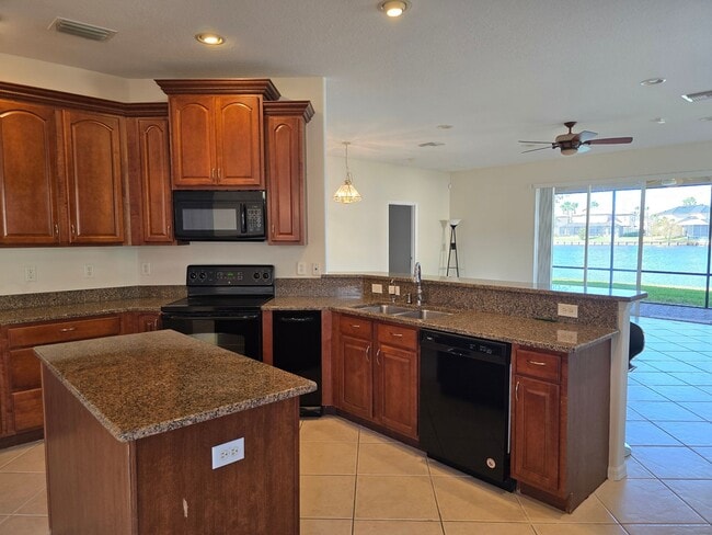 Building Photo - Lakefront Single Family Home with Views of Outdoor Paradise