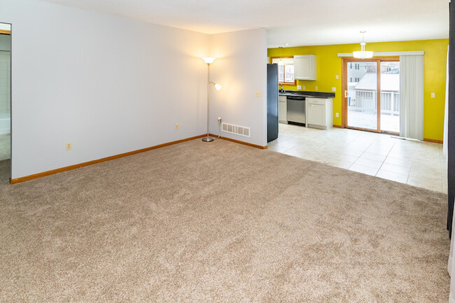 living room view to deck and kitchen - 874 22nd Ave SE