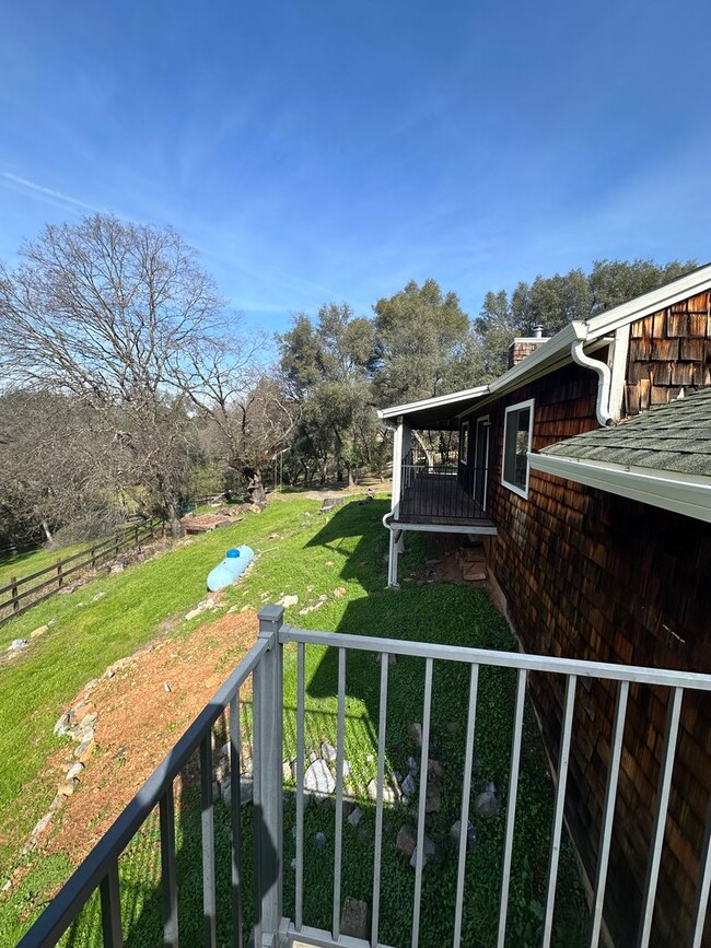 Building Photo - Beautiful home with lots of Land in Grass ...