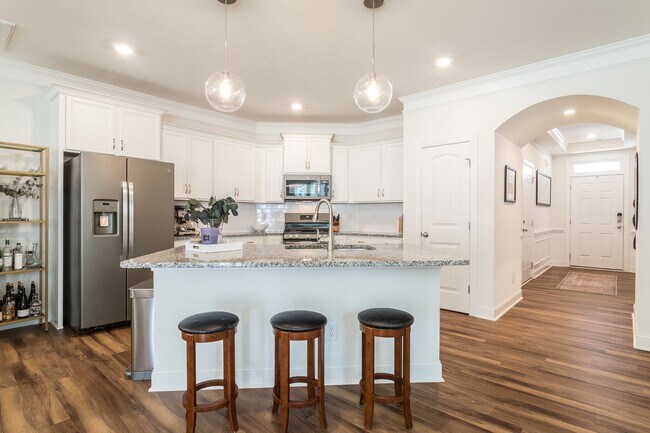 Building Photo - Spacious, Stylish & Move-In Ready! 3BR End Unit Townhome in Durham