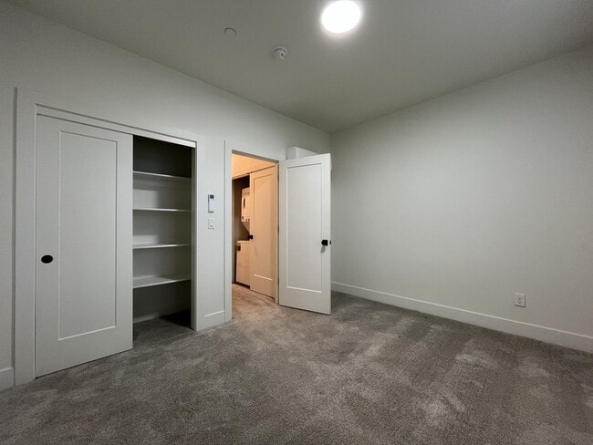 Building Photo - Modern 2-Bed, 1.5-Bath Condo with Custom Kitchen, Private Patio, and Prime Location