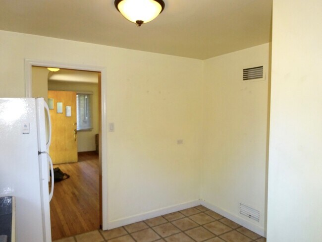 Building Photo - Two Bedroom Apartment With Hardwood Floors...