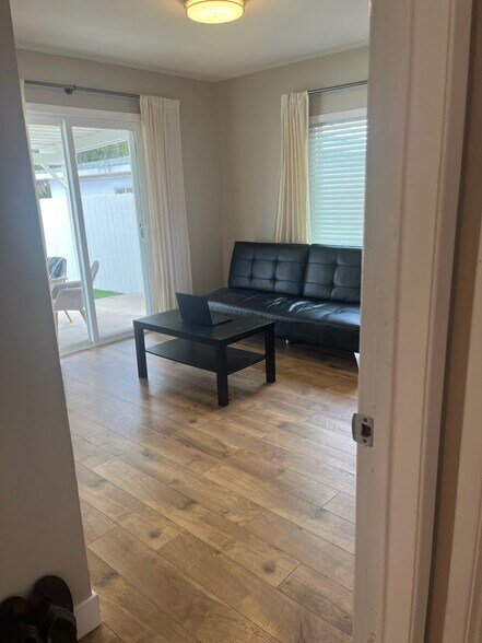 Bedroom #1 offers sliding door directly to outside private yard. - 3673 Cherokee Ave