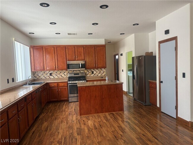 Building Photo - 6574 American Beauty Ave