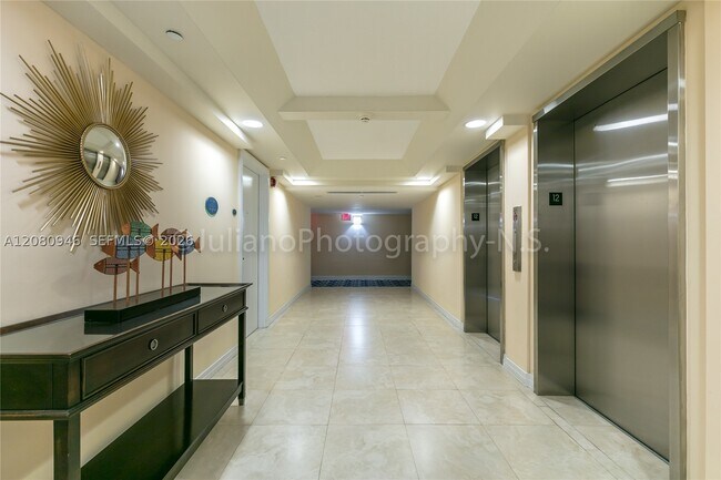 Building Photo - 6917 Collins Ave