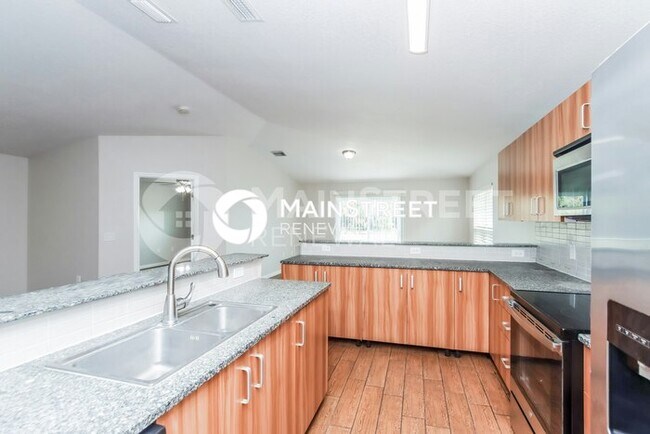 Building Photo - 4 Bedroom Pet-Friendly Home in PALM BAY, FL with Main Street Renewal