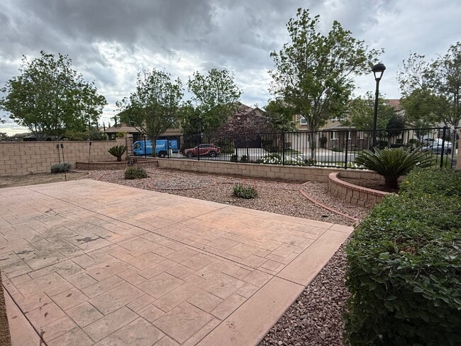 Building Photo - New flooring & paint!  Large backyard - landscaped and ready for garden!   Community pool, fitnes...