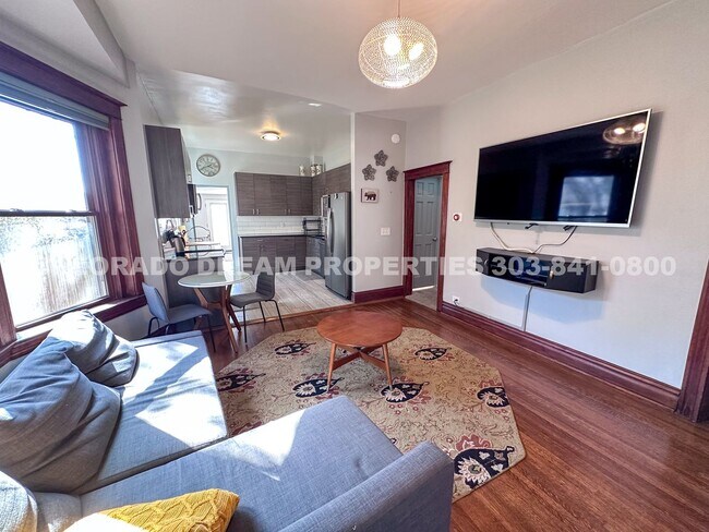 Building Photo - A home where old-world charm meets modern sophistication!