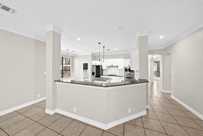 Building Photo - Corner Homesite. Gated Community. 4 Bedroom 1 Story with Formal Dining and Formal Office