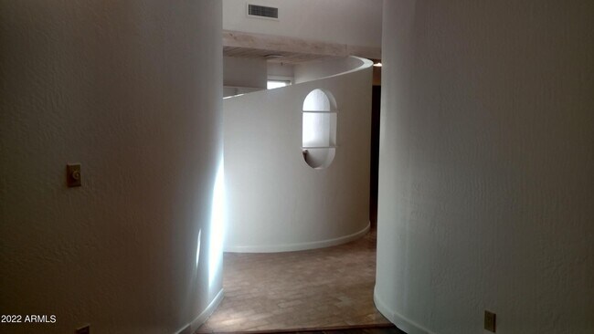 11. Semicircle entry hall - 33 W Missouri Ave
