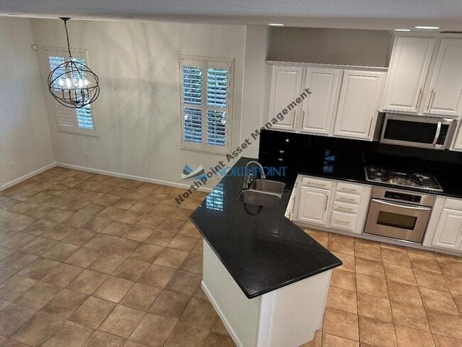 Building Photo - 4BR/3BA w/ Solar + Downstairs Bed/Bath in Whitney Oaks