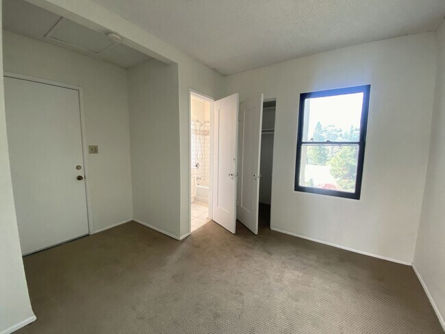 Building Photo - Craftsman Style One Bedroom with Decorative Fireplace! On Site Washer and Dryer & Assigned Storag...
