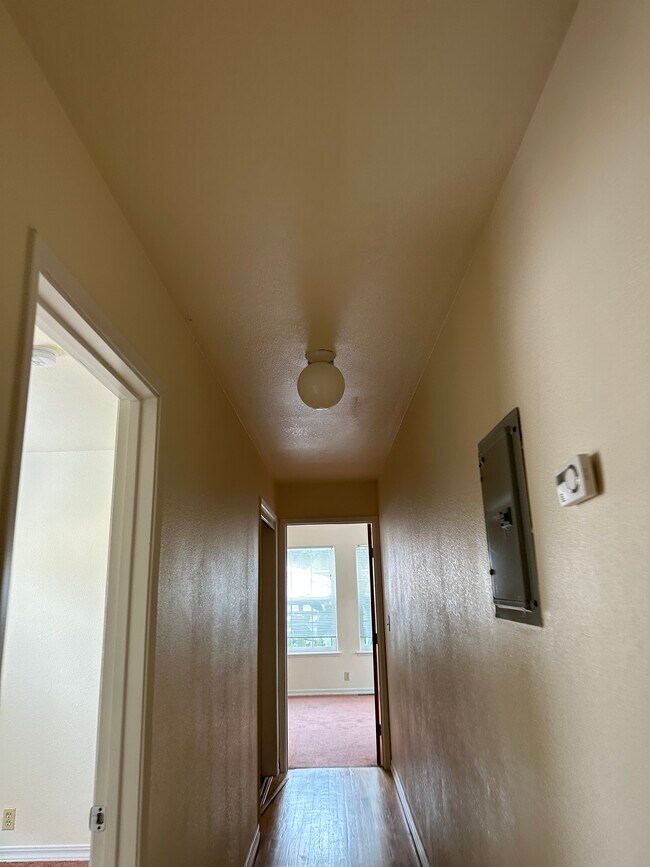 view from hall looking into back bedroom - 551 59th St
