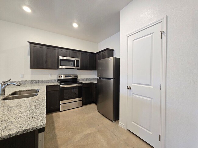 Building Photo - RENT SPECIAL - NEW IN MANAGEMENT - AVAILABLE NOW!