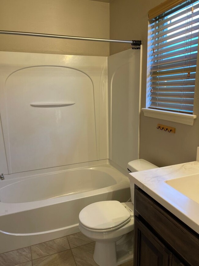 Building Photo - Neighborhood pond, playground, walking tra...