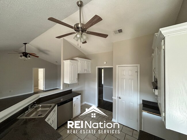Building Photo - HORN LAKE STUNNER! 3BR/2BA | Vaulted Ceilings & Fireplace | Covered Patio & Garage!