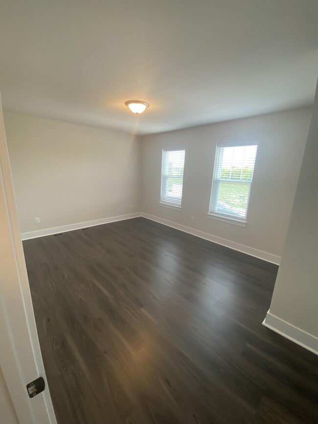 Building Photo - N161W21877 Daisy Dr