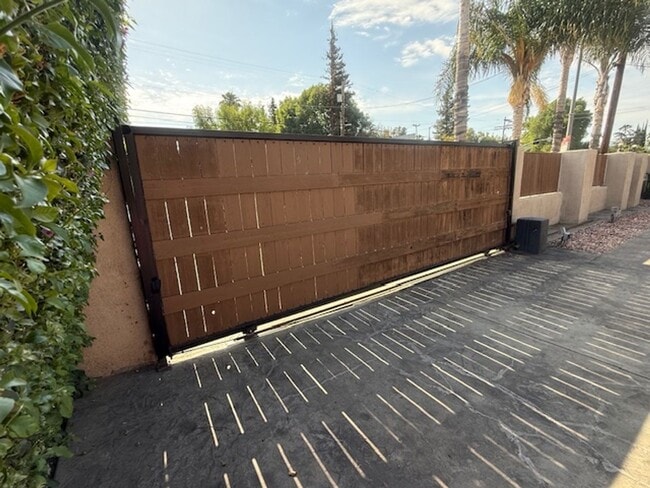 Building Photo - Gated estate with a backyard oasis