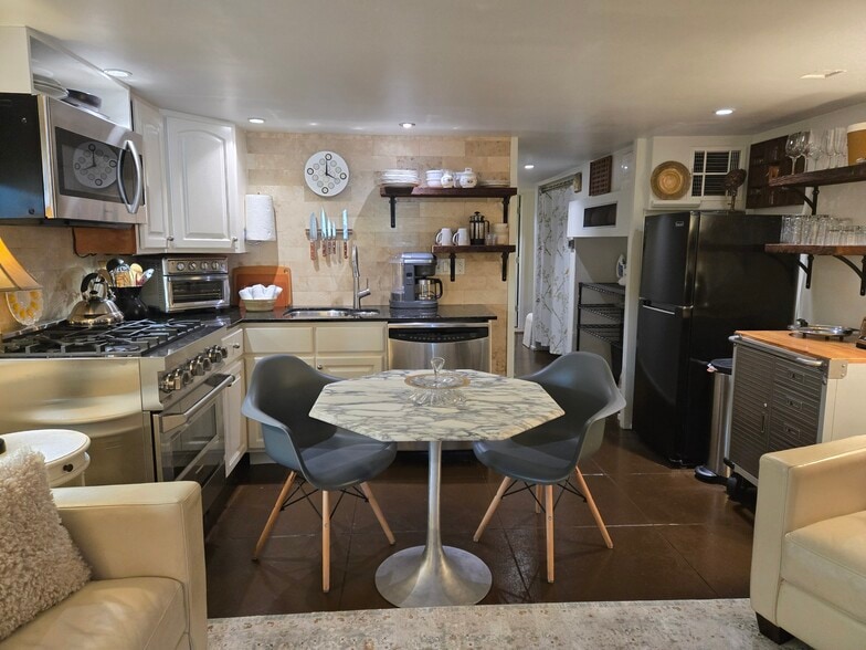 Kitchen with Gas Range, Cuisinart Air Fryer, Kitchen Aid Coffee Maker - 130 S Cortez St