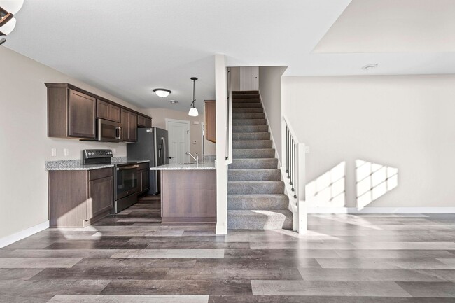 Building Photo - New 3 Bedroom Townhome
