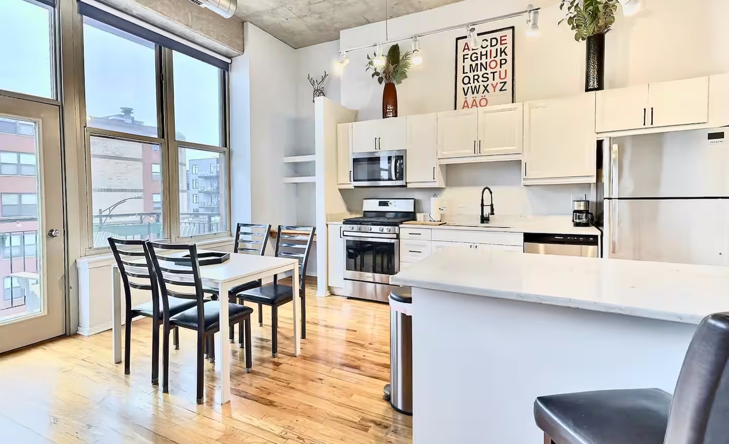 Island and kitchen table with lots of seating for entertaining - 6 S Laflin St