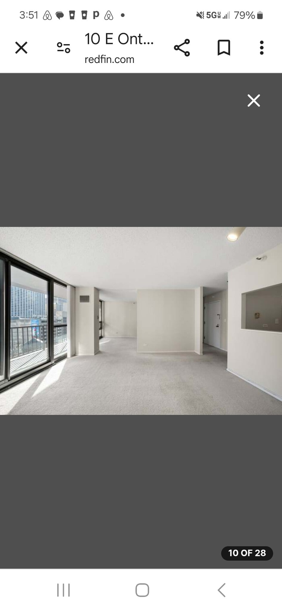 Large living room open to bedroom lots of natural light facing easy - 10 E Ontario St