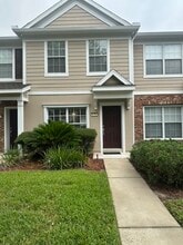 Building Photo - Stunning Townhome With Pond View In Gated Community