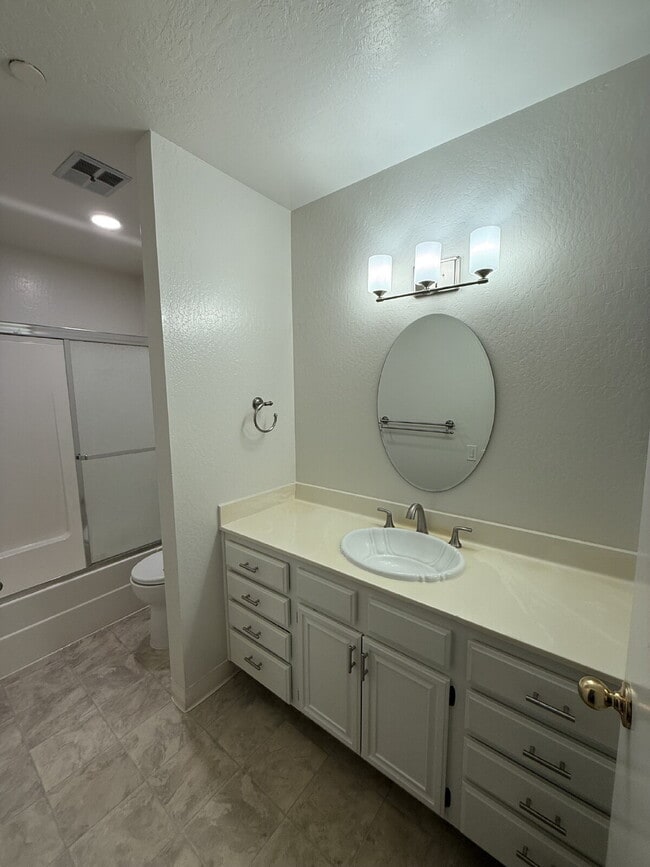 Building Photo - Spacious 3-Bedroom, 2-Bath Multi-Level Home with Balcony, In-Unit Laundry & Dual Parking