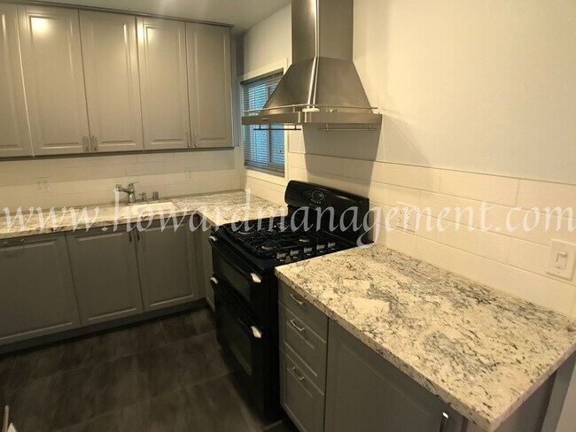 Building Photo - Beautiful lower condo with large patio in Tara Hills, a resort style living complex!