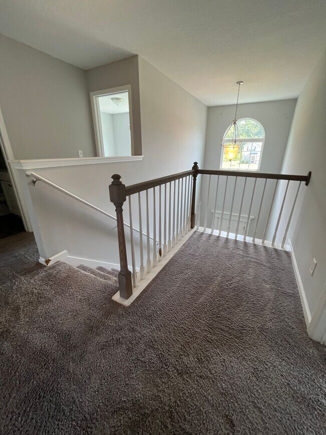 Building Photo - Spacious 4-Bedroom Pet Friendly Home with a Serene View - Available for Rent!