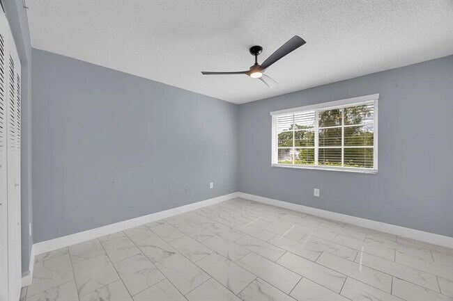 Building Photo - 3809 NW Mediterranean Ln