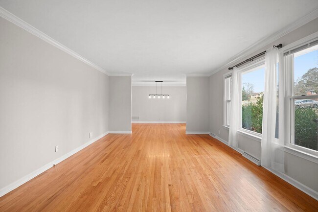 Building Photo - Spacious 4BR (or 3BR + Bonus) with 2 Living Rooms, Screened Porch & 4-Car Garage