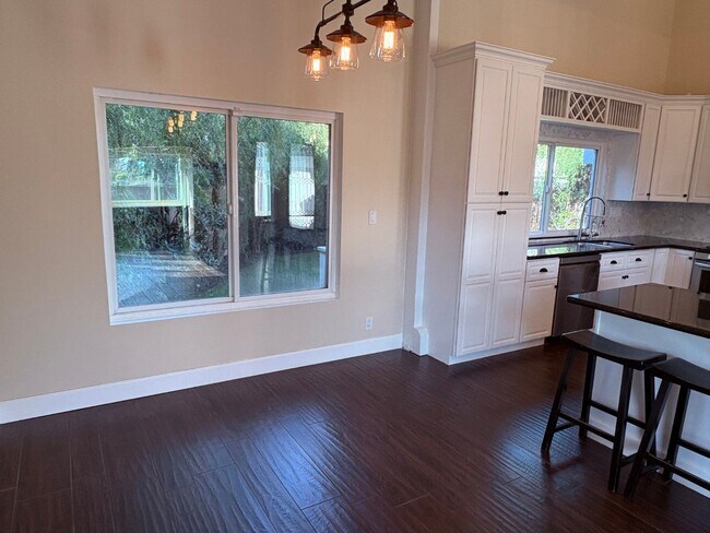 Building Photo - Upgraded 3 bedroom, 2 1/2 bath home with HUGE private yard.  This is a true hidden gem.